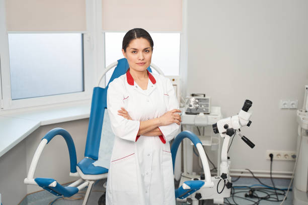 istock Competent female doctor standing at her workplace 1218681094