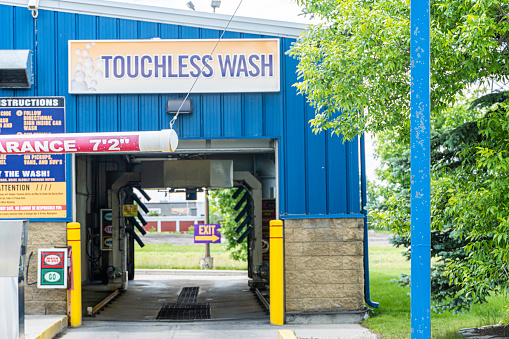 24 June 2019 - Calgary, Alberta Canada - Entrance to Touchless carwash in Calgary