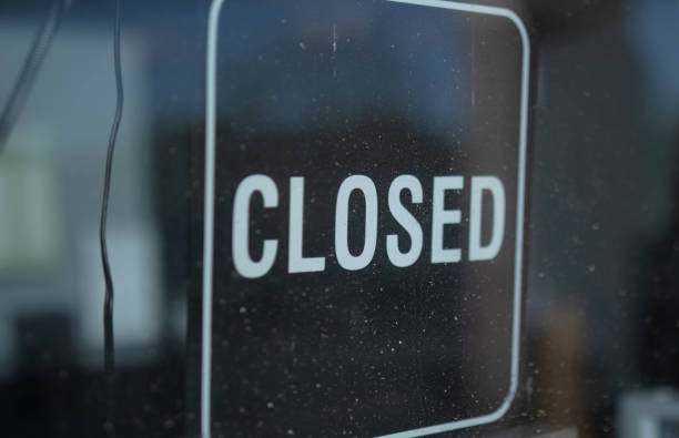 istock Closed sign on a business during quarantine 1218686159