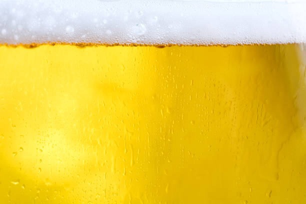 istock Background Cool beers with beer bubbles on top a glass at the party 1218686919