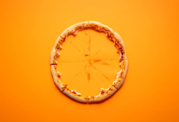 istock Pizza crust leftover and grease traces. Eaten pizza 1218687514