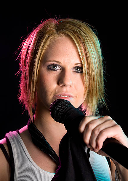 istock Young Woman Rock Singer 121868833