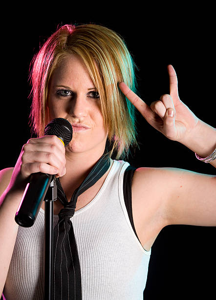 istock Young Woman Rock Singer 121868863