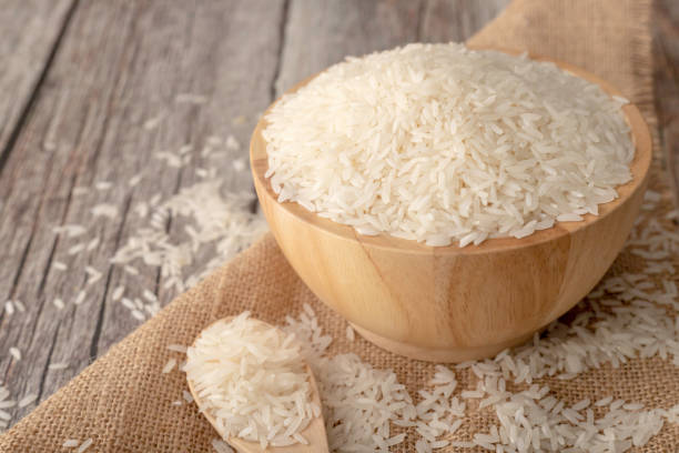 istock Rice in a brown bowl on the wooden table 1218691690