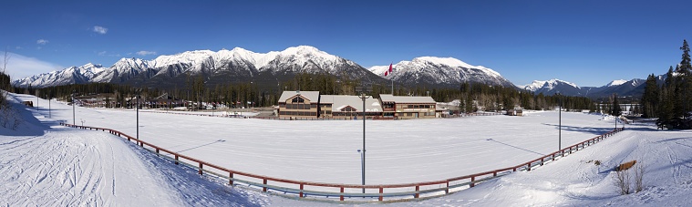 Canmore, Alberta - April 13, 2020: Sunny Springtime Landscape on deserted Canmore Nordic Centre. Alberta Provincial Parks have closed vehicle access due to COVID-19 Coronavirus Pandemic