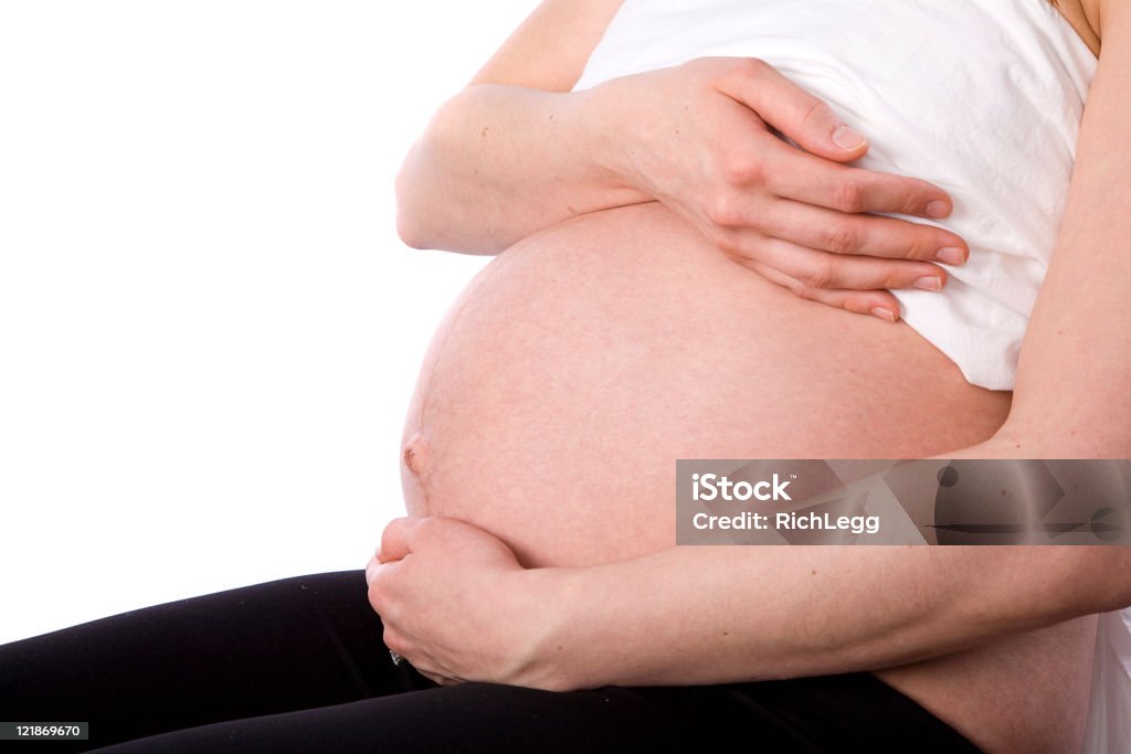 Pregnant Woman A close up of a pregnant woman. Adult Stock Photo