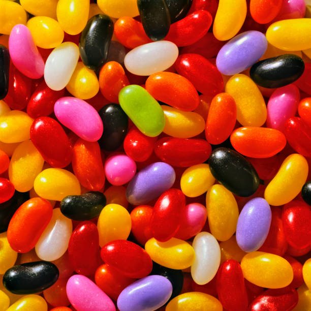 Jelly Bean Still Life A selection of multicolored jelly beans candy jellybean variation color image stock pictures, royalty-free photos & images