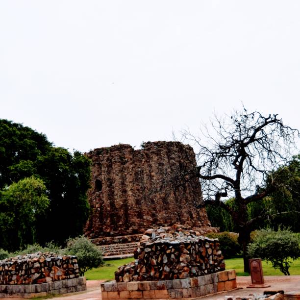 istock Inside the Qutub Minar Complex with antic ruins and inner square. UNESCO World Heritage in Mehrauli, Old Architecture inside Qutub Minar during the day time in Delhi India, Qutub Minar inside old architecture 1218700731