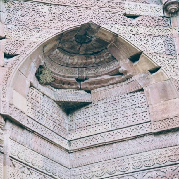 istock Inside the Qutub Minar Complex with antic ruins and inner square. UNESCO World Heritage in Mehrauli, Old Architecture inside Qutub Minar during the day time in Delhi India, Qutub Minar inside old architecture 1218700743