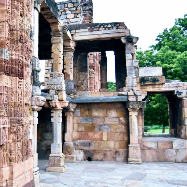 istock Inside the Qutub Minar Complex with antic ruins and inner square. UNESCO World Heritage in Mehrauli, Old Architecture inside Qutub Minar during the day time in Delhi India, Qutub Minar inside old architecture 1218700913