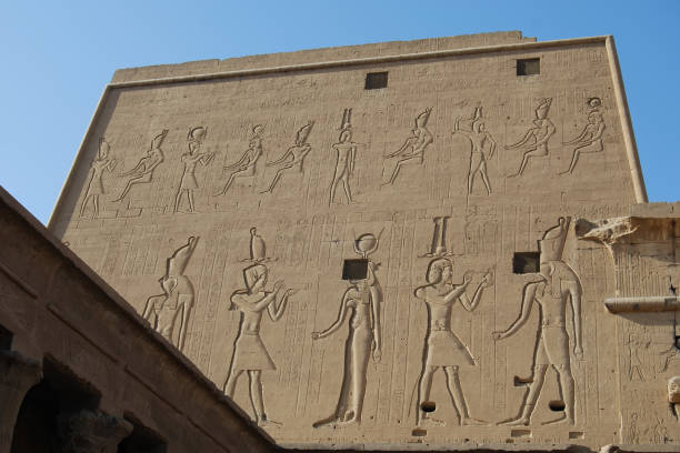 istock Pillars, reliefs and statue at the Edfu Temple. Nubia, Egypt 1218700953