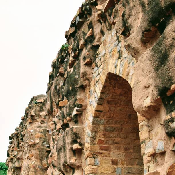 istock Inside the Qutub Minar Complex with antic ruins and inner square. UNESCO World Heritage in Mehrauli, Old Architecture inside Qutub Minar during the day time in Delhi India, Qutub Minar inside old architecture 1218700989