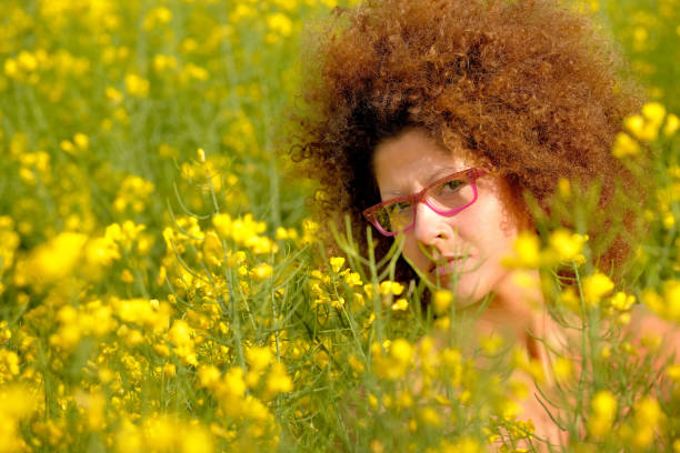 istock Beauty Relaxes In A Rapeseed Field 1218701911