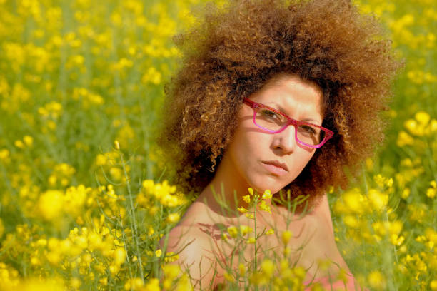 istock Beauty Relaxes In A Rapeseed Field 1218701932
