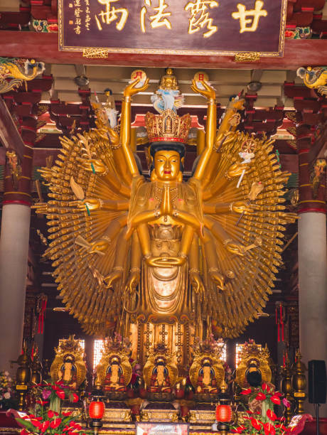 Golden 1000 hand Guanyin Goddess of Mercy statue in The Hall of Mahavira in kaiyuan temple at chaozhou city Guangdong province China.kaiyuan temple the largest temple in Fujian province Chaozhou/China-02 April 2018:Golden 1000 hand Guanyin Goddess of Mercy statue in The Hall of Mahavira in kaiyuan temple at chaozhou city Guangdong province China.kaiyuan temple the largest temple in Fujian province chaozhou guangdong stock pictures, royalty-free photos & images