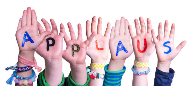 Children Hands Building Word Applaus Means Applause, Isolated Background Children Hands Building Colorful German Word Applaus Means Applause. White Isolated Background applaus stock pictures, royalty-free photos & images
