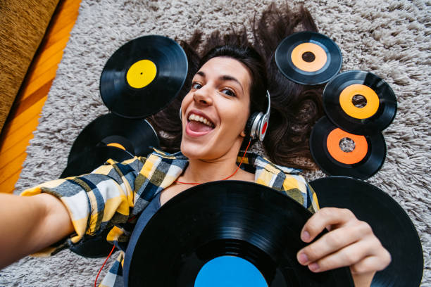istock Listening to old records and taking selfie 1218710178