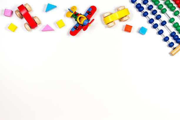 istock Baby kids toys frame on white background. Top view, flat lay. Copy space for text 1218711199