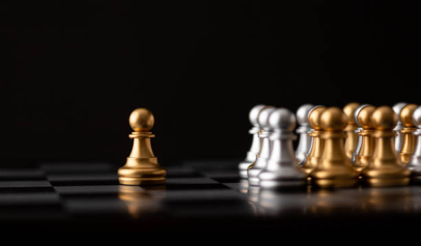 istock gold chessman is the leader 1218711562