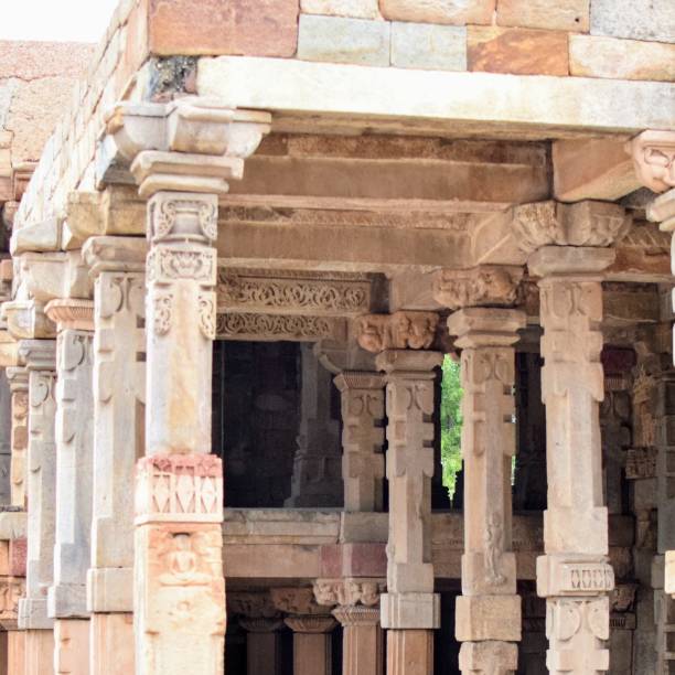 istock Inside the Qutub Minar Complex with antic ruins and inner square. UNESCO World Heritage in Mehrauli, Old Architecture inside Qutub Minar during the day time in Delhi India, Qutub Minar inside old architecture 1218712793
