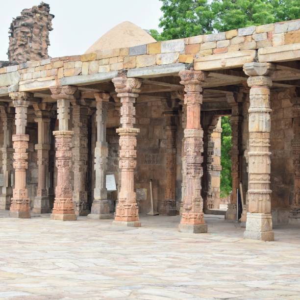 istock Inside the Qutub Minar Complex with antic ruins and inner square. UNESCO World Heritage in Mehrauli, Old Architecture inside Qutub Minar during the day time in Delhi India, Qutub Minar inside old architecture 1218712821