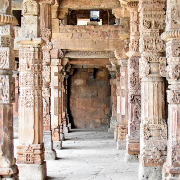 istock Inside the Qutub Minar Complex with antic ruins and inner square. UNESCO World Heritage in Mehrauli, Old Architecture inside Qutub Minar during the day time in Delhi India, Qutub Minar inside old architecture 1218712867