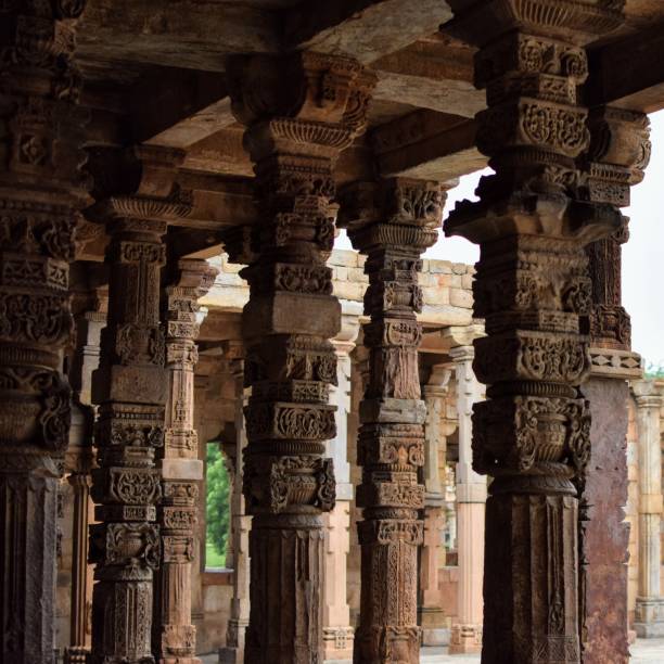 istock Inside the Qutub Minar Complex with antic ruins and inner square. UNESCO World Heritage in Mehrauli, Old Architecture inside Qutub Minar during the day time in Delhi India, Qutub Minar inside old architecture 1218712946