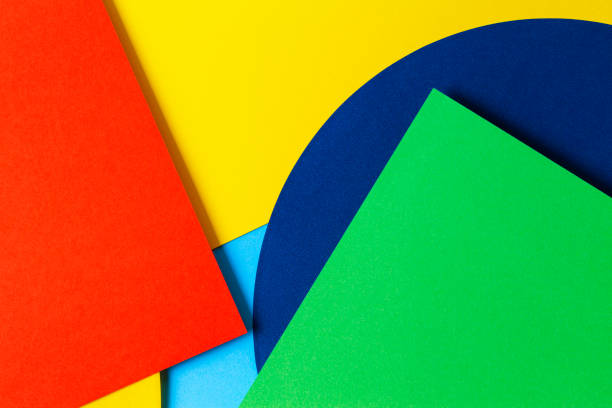istock Abstract colored paper texture background. Minimal geometric shapes and lines in red, light blue, yellow, navy, green colors 1218716752