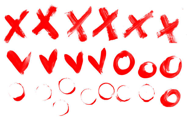 istock crosses ticks and circles drawn with red paint isolated on white paper 1218717099