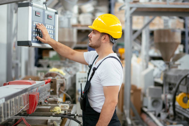 istock Young handsome factory worker. 1218718504