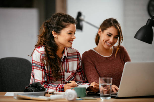 istock Girlfriends working together in the office 1218719900