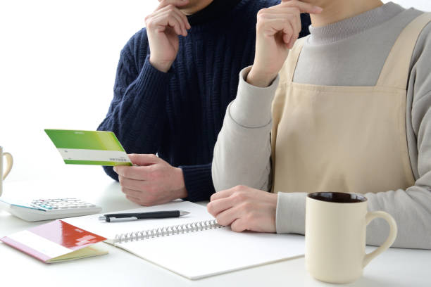 Japanese couple thinking about housekeeping budget