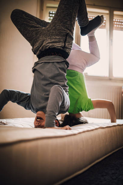 istock kids exercising at home  -covid 19 1218722270