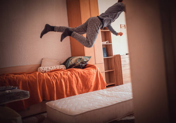 istock kids exercising at home  -covid 19 1218722350