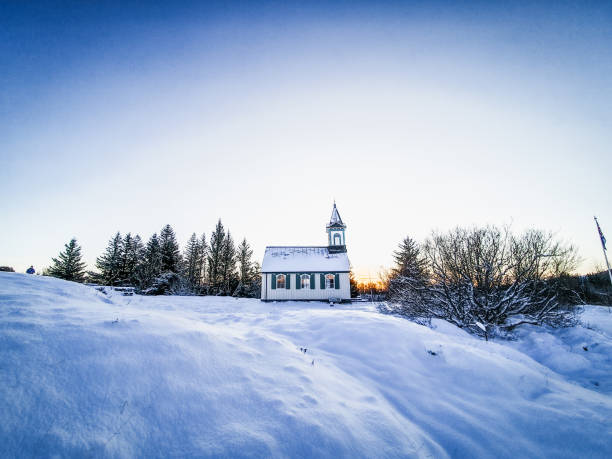A perfect, snowy winters morning at the church in Thingvellir National Park, Iceland.