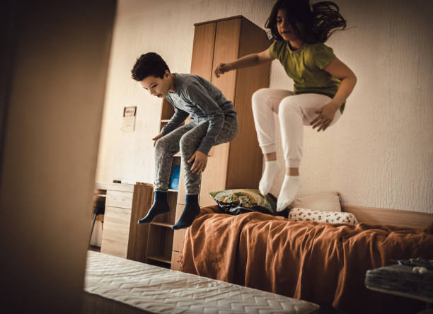 istock kids exercising at home  -covid 19 1218723207