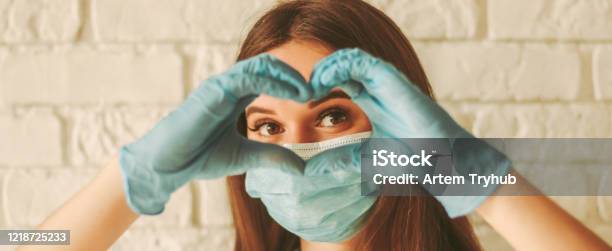 Banner Of Happy Woman Looks Through Hands In Form Of Heart Stock Photo - Download Image Now