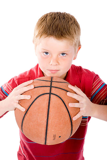istock Young Boy with Basketball 121872538