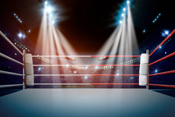 Cтоковое фото боксерский ринг с подсветкой прожекторами. - Иллюстрация
