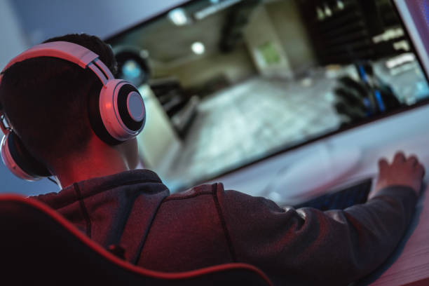 istock The young gamer playing online video game on his personal computer 1218726669