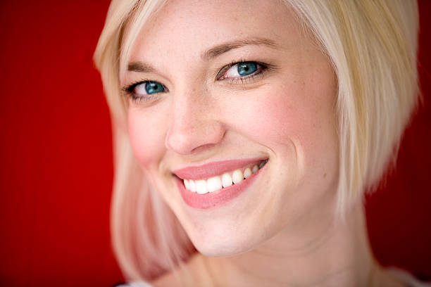 Woman portrait with drawing contour on lips microblading tattoo procedure.