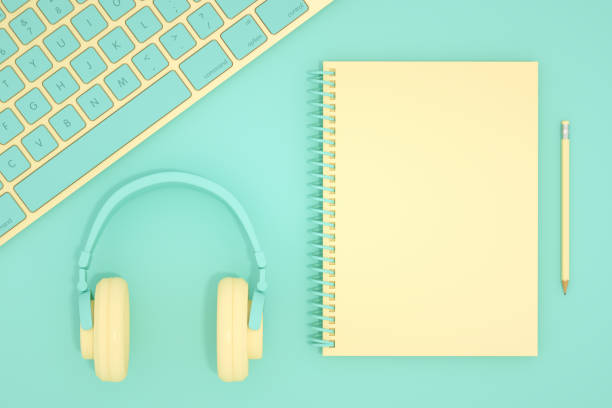 3D rendering top view of workplace with keyboard and spiral notebook, Technology Idea Concept. Flat Lay. Turquoise colored background.