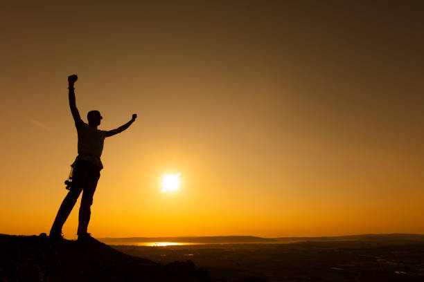 istock Male Hiker Celebrating Success 1218729386