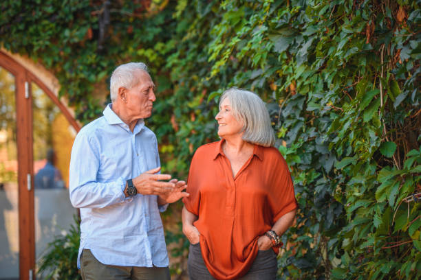 spanish senior couple enjoying walk and conversation - 3494 imagens e fotografias de stock