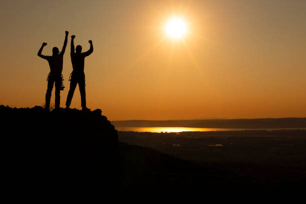 istock Silhouettes of team 1218731304