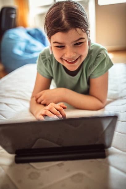 istock Child using smartphone for distance online studying- COVID-19 1218731816