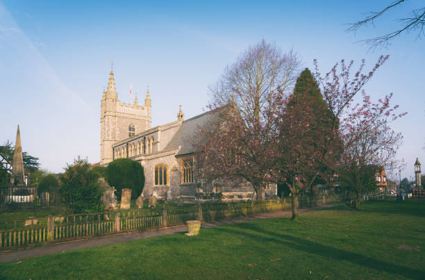 Ashford, Kent, United Kingdom - March 9, 2020: Entrance to St Mary the Virgin Church with gate, railings and signage