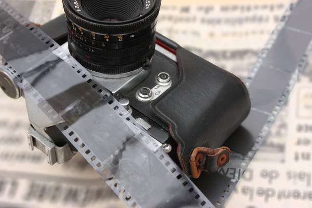 Old film camera  Old newspaper   Newspaper headline