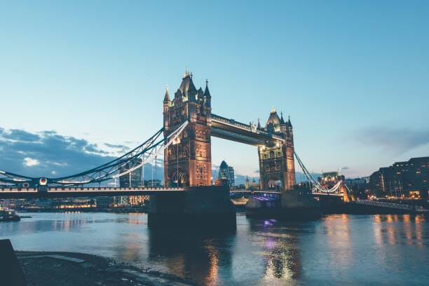 istock Tower bridge with Thames river during sunset in London UK 1218736375