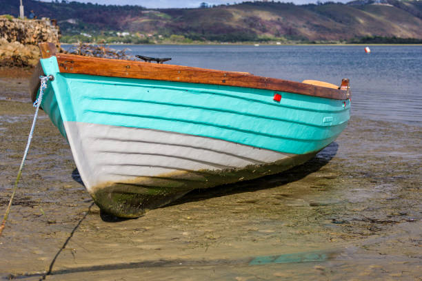 istock Low angle view of a blue and white dinghy 1218737586